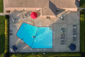 Aerial view of Eastbrook Apartments community and pool in Greenville, NC